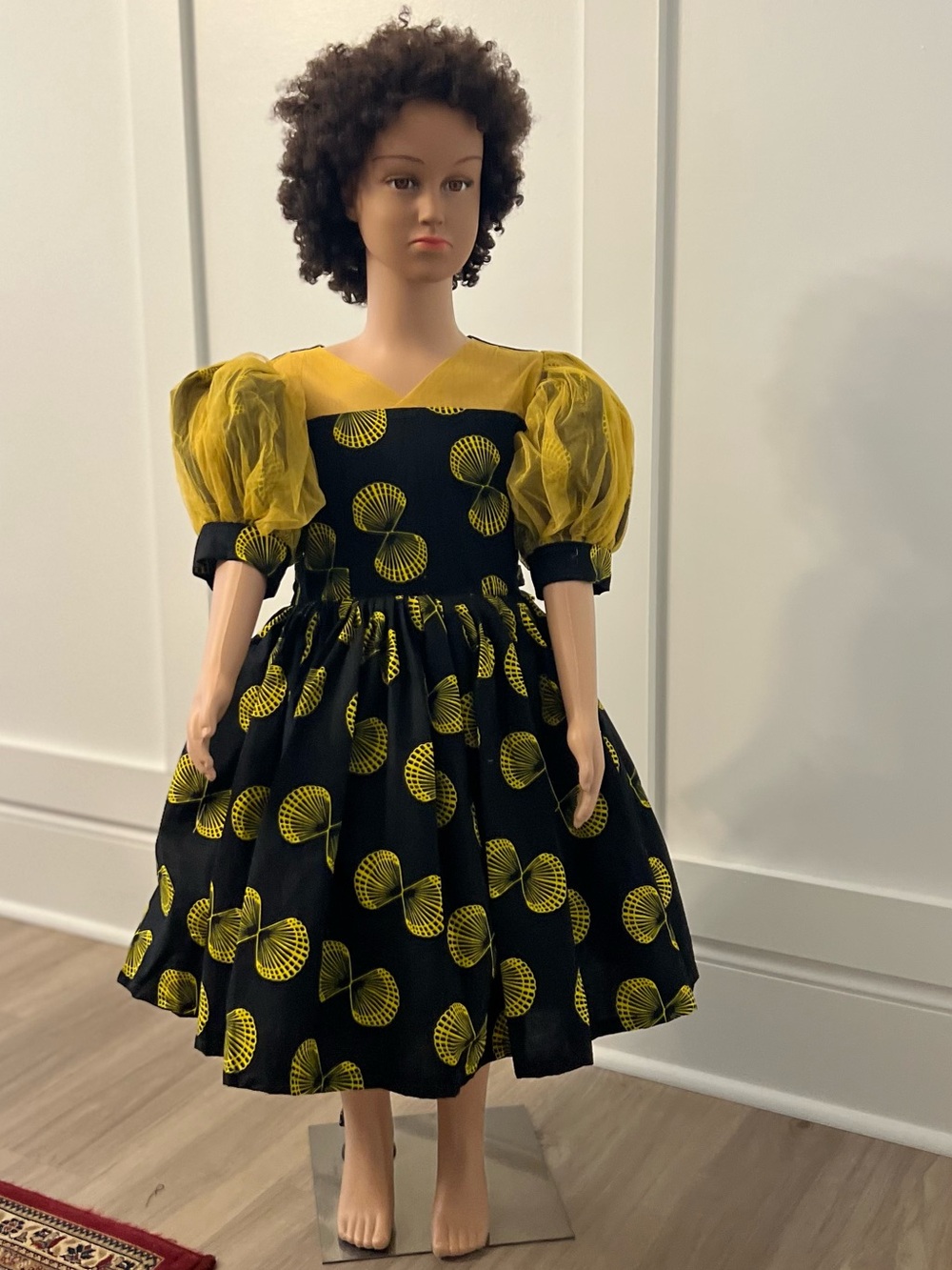 Black African Print Fit-and-Flare Dress with Yellow Circular and Puff Sleeves